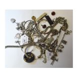 A silver albert, with a silver fob, a silver charm bracelet,