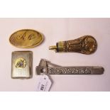 A cigar clipper, an oval horn snuff box, initialled,