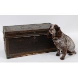 A George III leather trunk, with brass mounts and studwork decoration,
