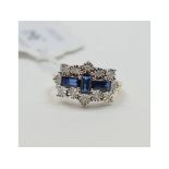 A 9ct gold, sapphire and diamond ring, approx.