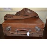 A Drew & Sons leather suitcase, initialled, in its canvas protective case, 56 cm wide,