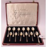 A set of twelve silver tea and coffee spoons, cased, Sheffield 1974, approx. 3.