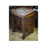 A late Victorian rosewood davenport,