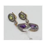 A pair of 9ct gold, silver, amethyst,