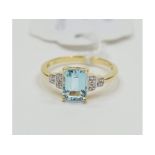 A 9ct gold, blue topaz and diamond ring, approx.