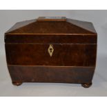 A 19th century yew wood tea caddy, of sarcophagus form, lacks interior, 20 cm wide,