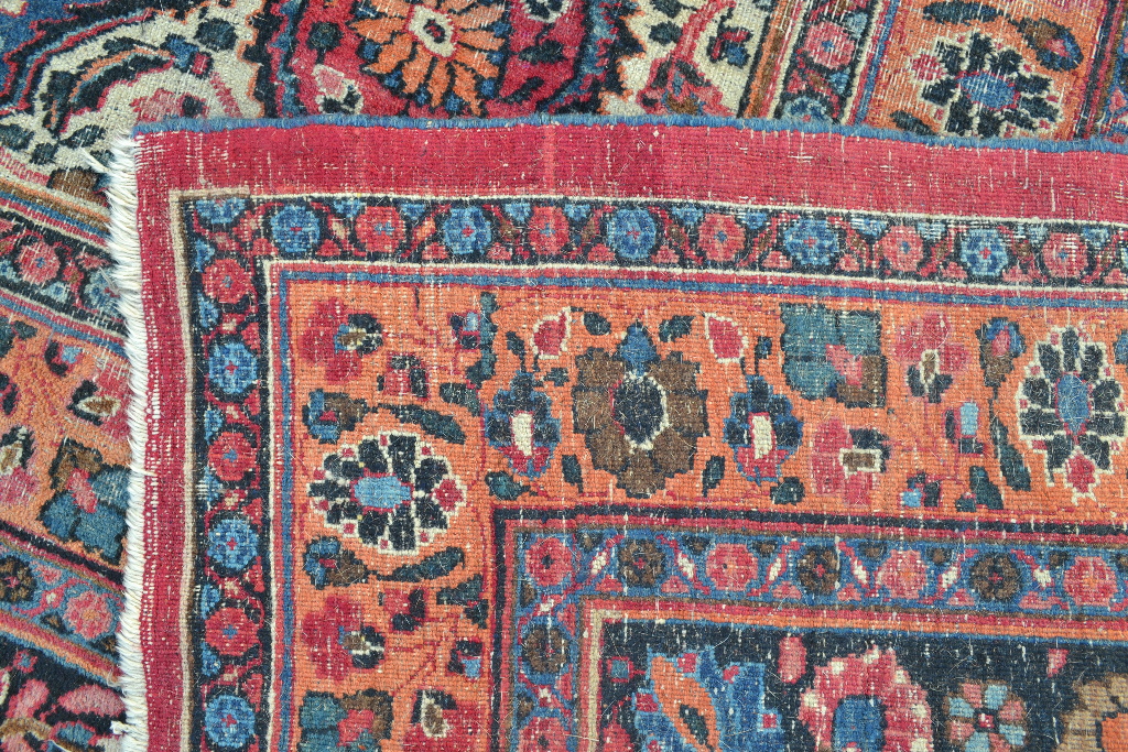 A Persian carpet, decorated a central floral medallion on a pink ground, within a multi border, - Bild 7 aus 7