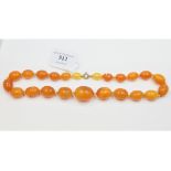 A string of graduated amber type beads Condition report Report by NG Approx. 55.