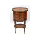 A Louis XV style oval bedside chest, having a pierced brass ¾ gallery,
