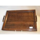 A rectangular oak two handled tray, 47 cm wide, glass,