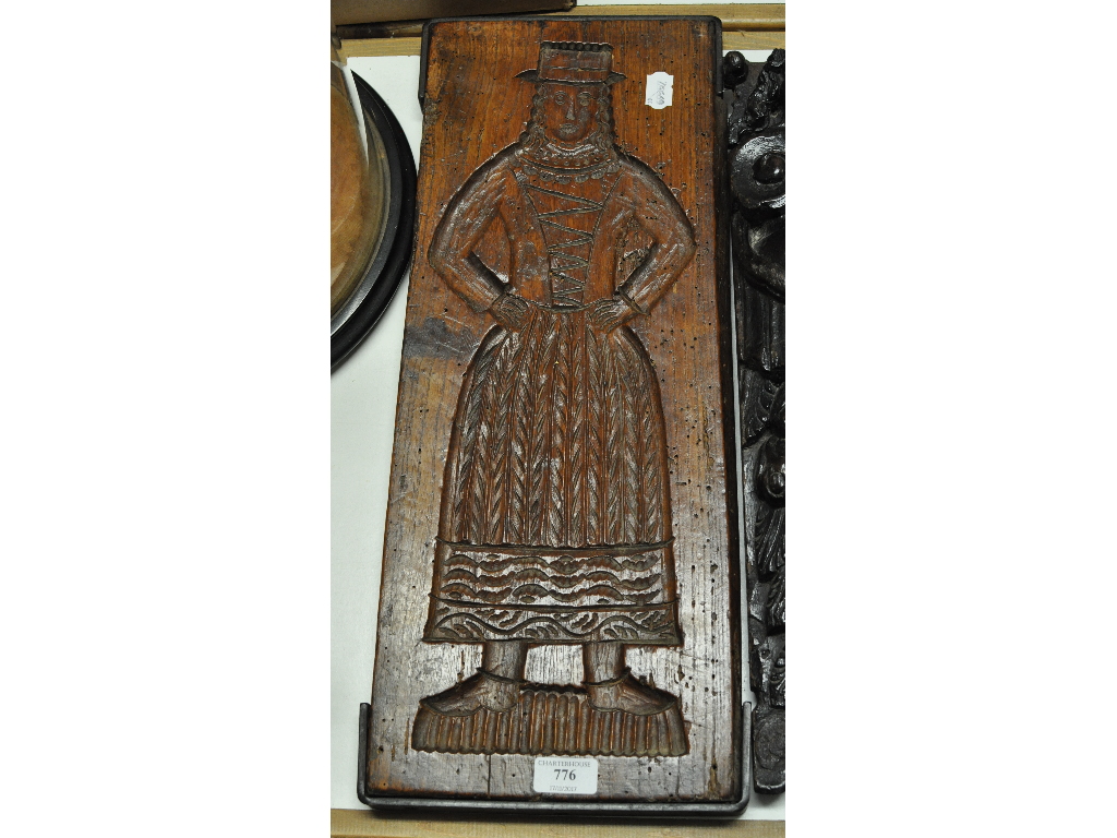 A Dutch treen double sided gingerbread mould, with iron strapwork, some worm,