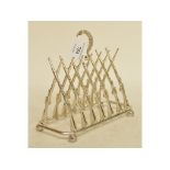 A plated rifle shooting toast rack,