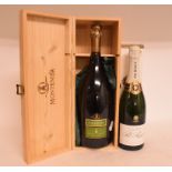 A bottle of Pol Roger Reserve Champagne, boxed, and a magnum Montenisa Franciacorta,