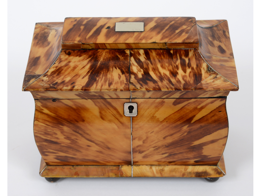 A 19th century tortoiseshell veneered tea caddy,