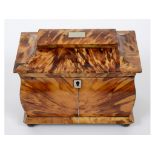 A 19th century tortoiseshell veneered tea caddy,