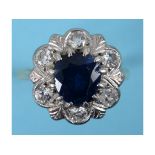 An 18ct gold, platinum, sapphire and diamond flowerhead ring, approx.