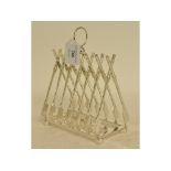 A silver plated rowing toast rack,