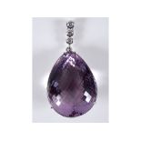 A large faceted pear shaped amethyst, in an 18ct white gold pendant mount,