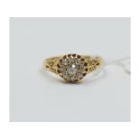 An 18ct gold and diamond flowerhead ring, inscribed and dated 26/9/07, approx.