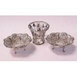 A pair of Edwardian silver bon bon dishes, with embossed and pierced decoration, Sheffield 1902,