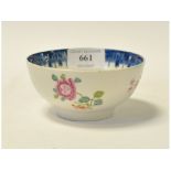 A late 18th century Lowestoft porcelain bowl, decorated flowers in enamel, restored,