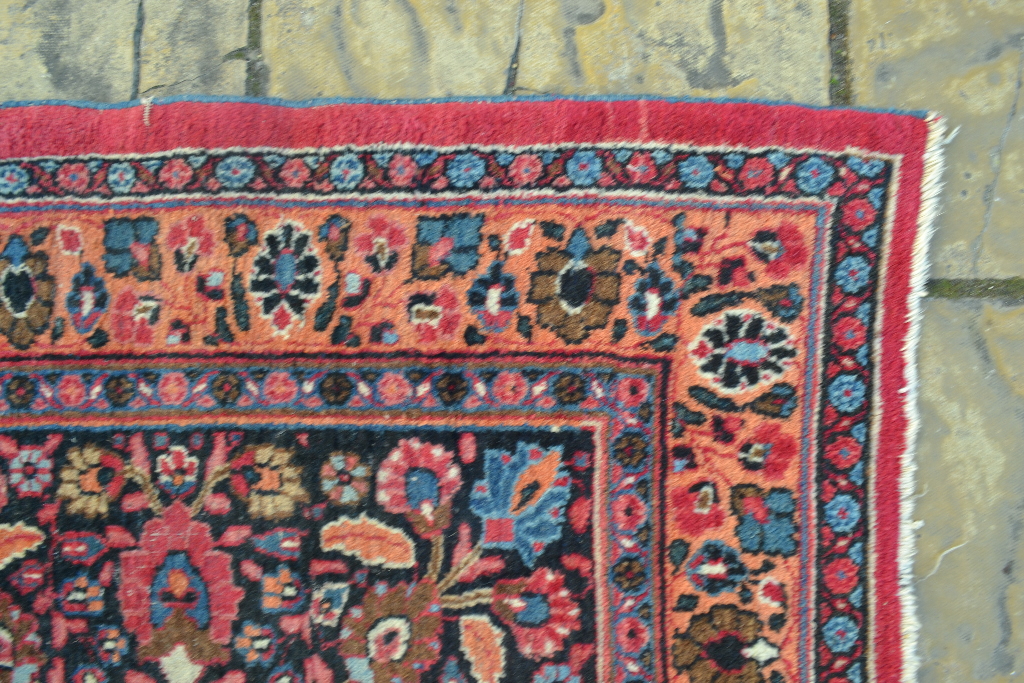 A Persian carpet, decorated a central floral medallion on a pink ground, within a multi border, - Bild 6 aus 7