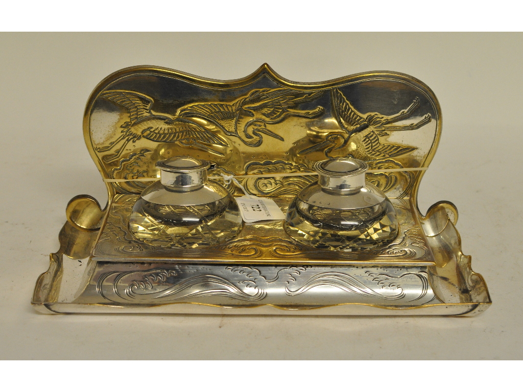 An aesthetic silver plated desk stand, set two inkwells with silver mounts, Birmingham 1906, 29.