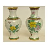 A pair of cloisonné vases, decorated flowers and insects, 31.