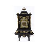 A late Victorian bracket clock, the 18 cm arched square brass dial signed Wall, Rotherham,