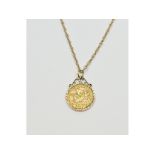 An Edward VII half sovereign, 1909, in a 9ct gold pendant mount, on a 9ct gold chain, approx. 9.