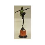 An Art Deco style bronze figure, of a dancing lady, on a marble base,