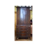 A reproduction mahogany linen press,