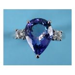 An 18ct white gold, tanzanite and diamond ring,