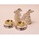 A pair of novelty plated salts, in the form of rabbits,