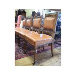 A set of four Victorian gothic style walnut dining chairs (4)