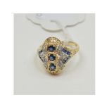 An Art Deco style 9ct gold, sapphire and diamond ring, approx.