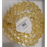 A faceted citrine bead necklace Condition report Report by NG Approx.