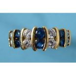 An 18ct gold, sapphire and diamond ring, approx.