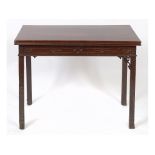 A late 18th century mahogany tea table, with blind fret carved decoration,