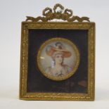 English school, 19th century, a circular bust portrait miniature of a lady,