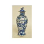 A Chinese blue and white prunus vase and associated cover, four character mark to base,