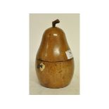 A turned wood tea caddy, in the form of a pear,
