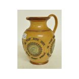 A Doulton Lambeth stoneware jug, He That Buys...