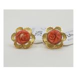 A pair of yellow coloured metal and coral earrings,