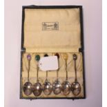 A set of six Liberty & Co silver coffee spoons, with agate bean finials, Birmingham 1930, cased,