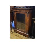 A late Victorian walnut pier cabinet, with floral marquetry inlaid decoration, 80.