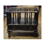 A Victorian Aesthetic period ebonised canterbury, the drawer numbered 8328,