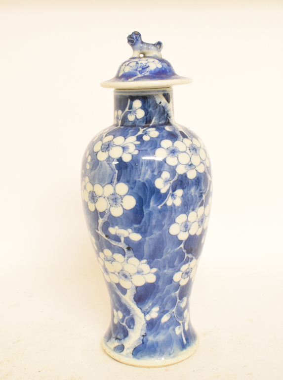 A Chinese blue and white prunus vase and associated cover, four character mark to base,