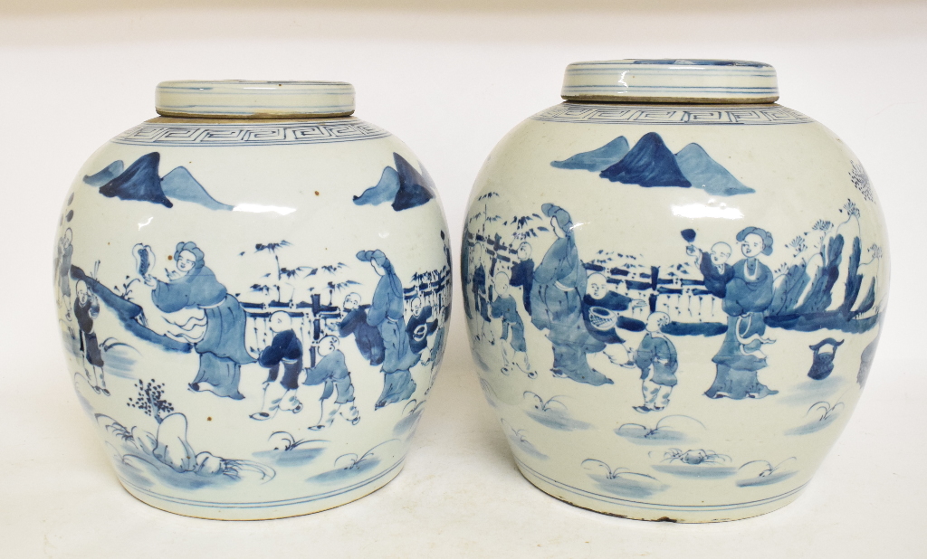 A pair of Chinese blue and white porcelain ginger jars and covers, decorated figures in a landscape,