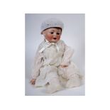 A Franz Schmidt bisque head character baby doll,